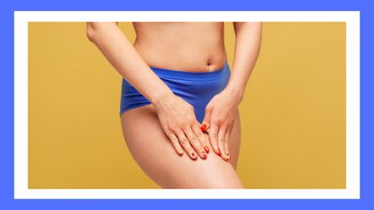 women's lower half of body in blue undies on a yellow background