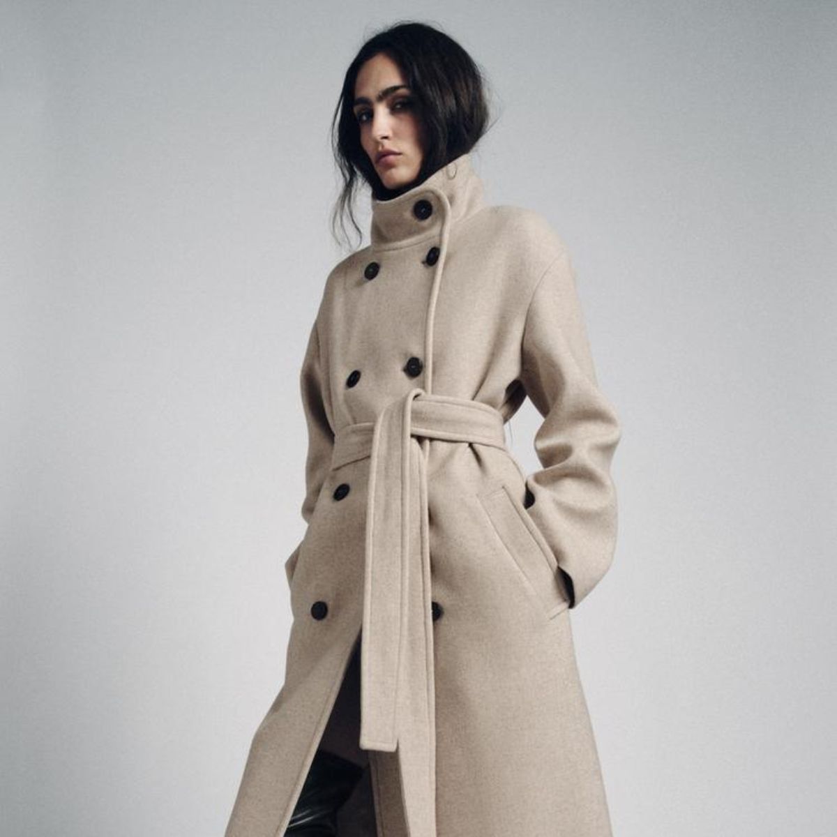 model wearing black Zara coat