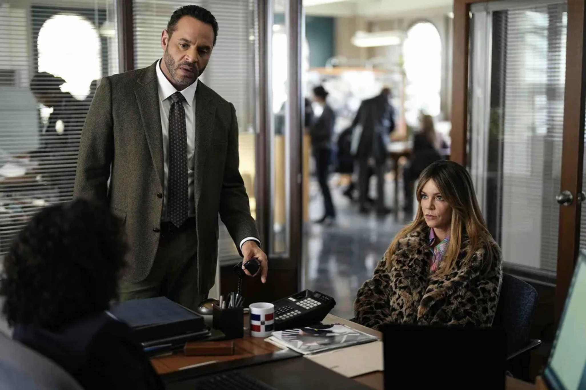 an image of Morgan (Olsen) in the Lieutenant&#039;s office with Karadec (Sunjata)