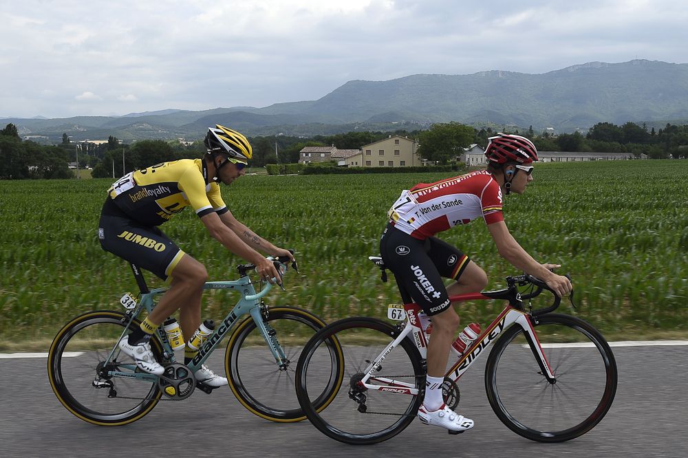 Netherlands' Martijn Keizer and Belgium's Tosh Van Der Sande ride in a breakaway during the 228 km fourth stage.