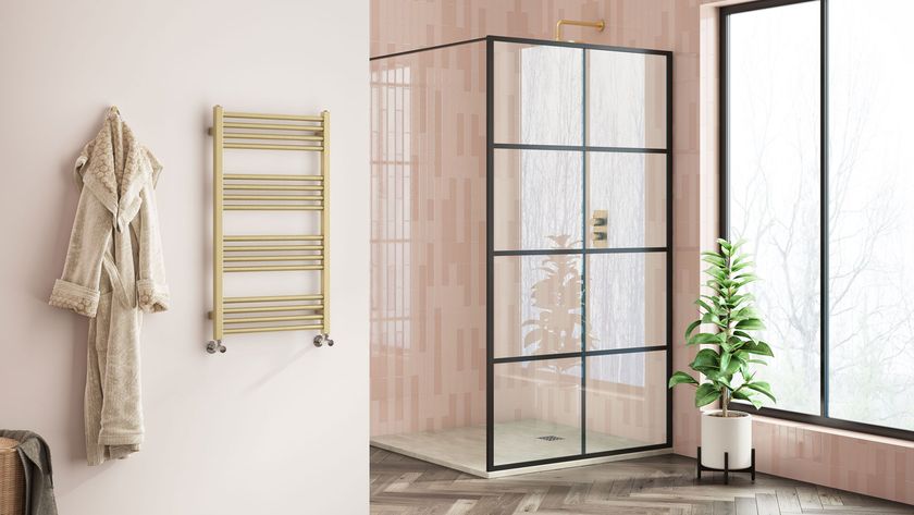 pink bathroom with herringbone flooring and brass heated towel rail