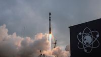 a black and white rocket launches into a cloudy sky.