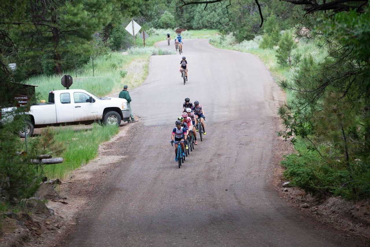 Pavement ends, party begins. Evlyn Dong leads a thinned out group .