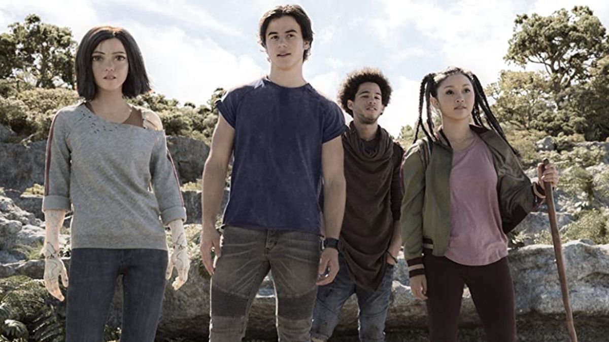 Rosa Salazar, Keean Johnson, Jorge Lendeborg Jr., and Lana Condor search the woods together in Alita: Battle Angel.