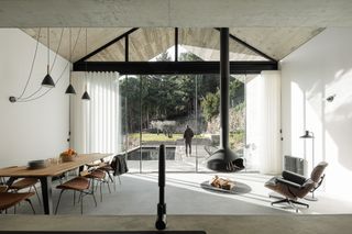 Living space looking out at Portuguese farm house by NaMora House