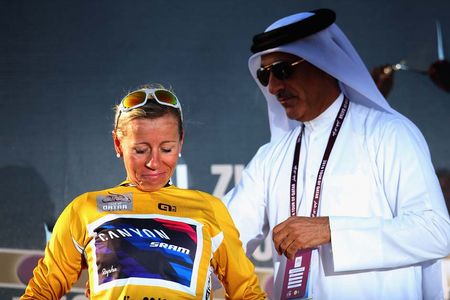 Trixi Worrack puts on the leader's jersey