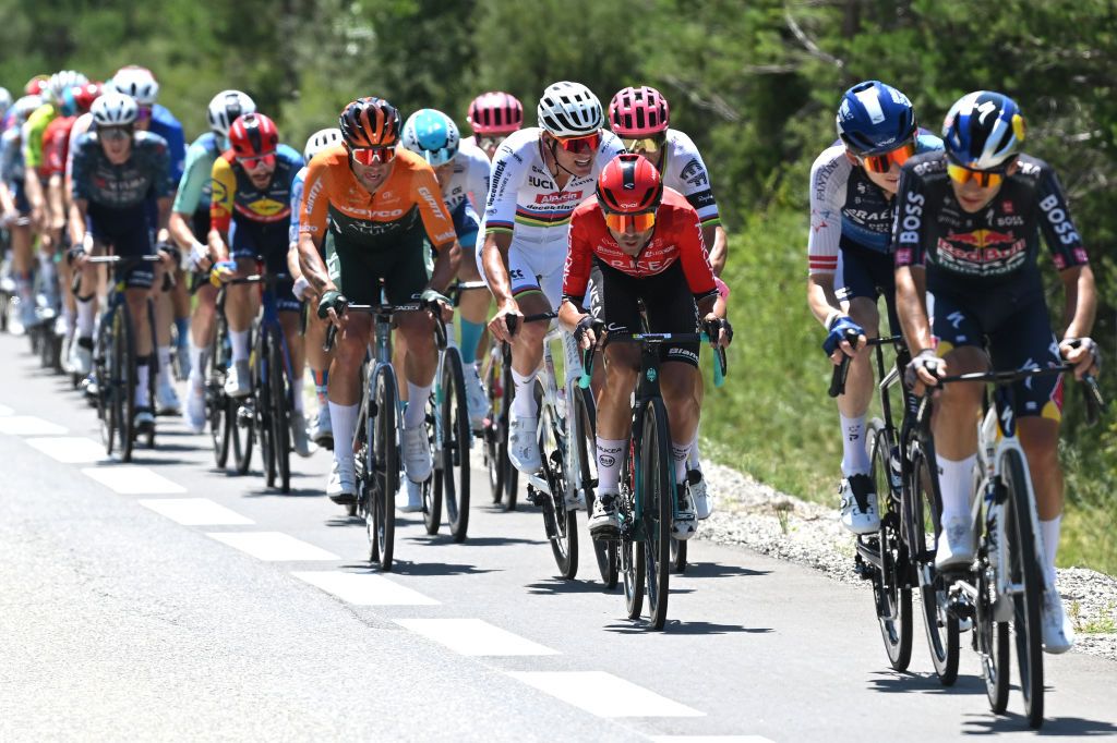 BARCELONNETTE FRANCE JULY 18 LR Michael Matthews of Australia and Team Jayco AlUla Mathieu van der Poel of Netherlands and Team Alpecin Deceuninck and Cristian Rodriguez Martin of Spain and Team Arkea BB Hotels competes in the breakaway during the 111th Tour de France 2024 Stage 18 a 1795km stage from Gap to Barcelonnette 1134m UCIWT on July 18 2024 in Barcelonnette France Photo by Dario BelingheriGetty Images
