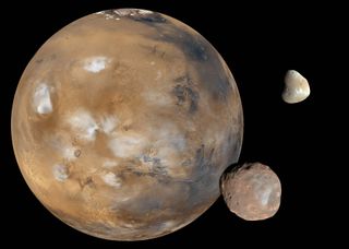 a large red planet and two smaller brownish moons