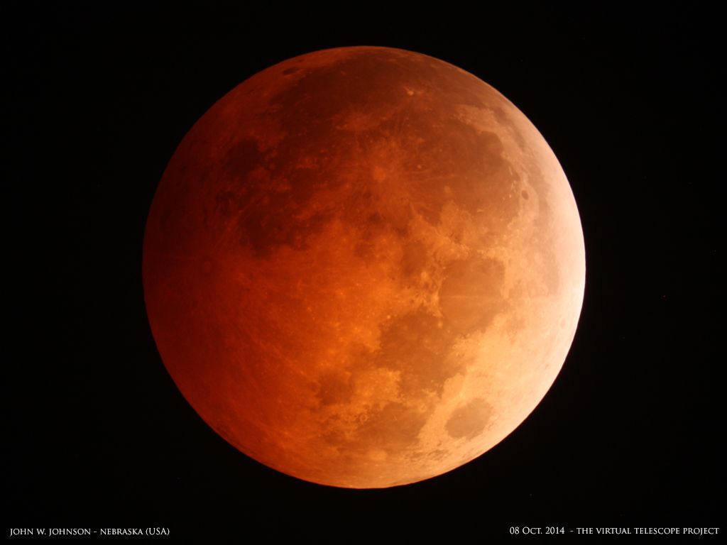 The spectacular &quot;blood moon&quot; total lunar eclipse of Oct. 8, 2014 is captured by photographer John W. Johnson of the Omaha Astronomical Society in Nebraska in the United States.