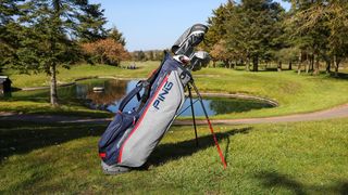 Ping Hoofer Lite Stand Bag and its lovely design resting on the golf course