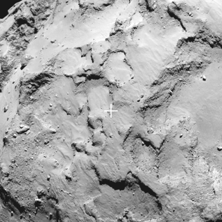 This close-up of the Comet 67P/Churyumov–Gerasimenko shows a super closeup view of the landing site (marked) for the Philae lander on the European Space Agency's Rosetta spacecraft. The target, called Landing Site J, is near the "head" of the comet, with landing set for Nov. 11, 2014.