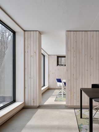 timber clad interior by Reigo & Bauer