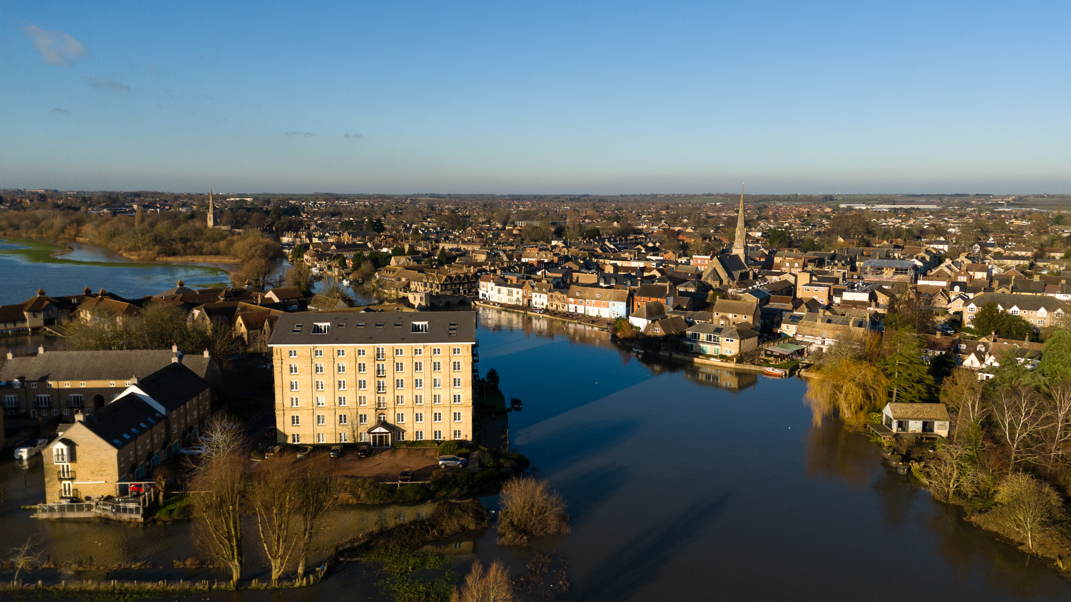 Photo of houses and a river taken with the DJI Flip