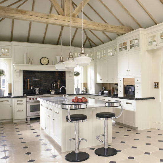 Kitchen with microwave and marble countertop