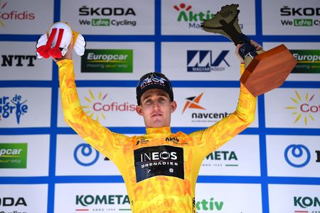 GYNGYSKKESTET HUNGARY MAY 15 Eddie Dunbar of Ireland and Team INEOS Grenadiers celebrates at podium as Yellow Leader Jersey final winner during the 43rd Tour de Hongrie 2022 Stage 5 a 184km stage from Miskolc to GyngysKkestet 992m tourdehongrie on May 15 2022 in GyngysKkestet Hungary Photo by Dario BelingheriGetty Images
