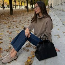 Felicia Akerstrom in taupe Hermes loafers