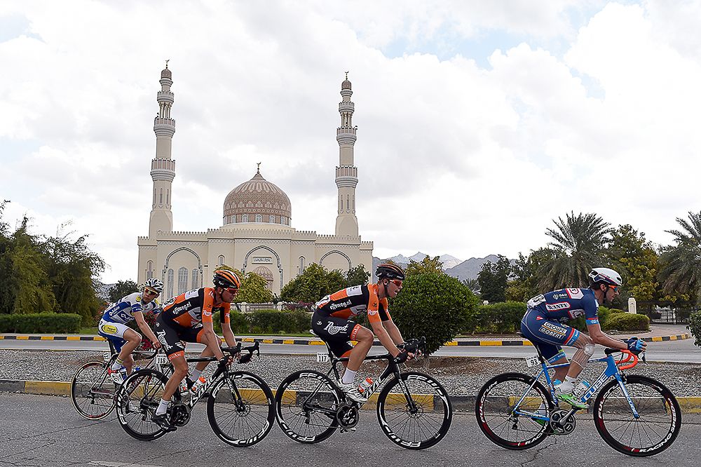 The breakaway passes a mosque during stage 2 in Oman.