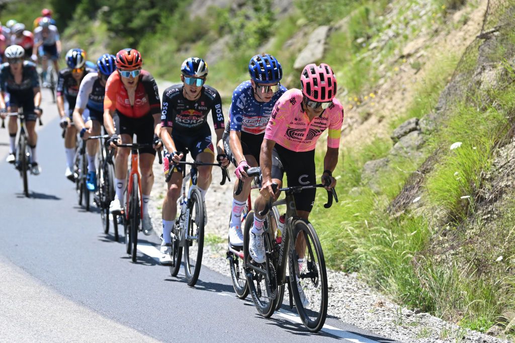 BARCELONNETTE FRANCE JULY 18 LR Jai Hindley of Australia and Team Red Bull BORA hansgrohe Sean Quinn of The United States and Team EF Education EasyPost and Richard Carapaz of Ecuador and Team EF Education EasyPost compete in the breakaway during the 111th Tour de France 2024 Stage 18 a 1795km stage from Gap to Barcelonnette 1134m UCIWT on July 18 2024 in Barcelonnette France Photo by Dario BelingheriGetty Images