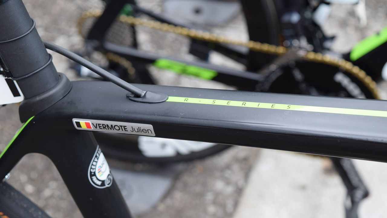 Green decals stand out on the raw carbon finish of the frameset