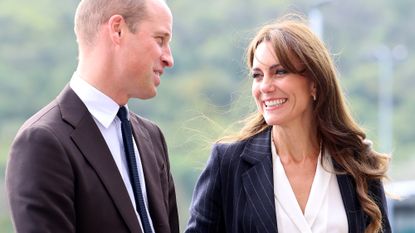 Prince William and Kate Middleton smile at each other 