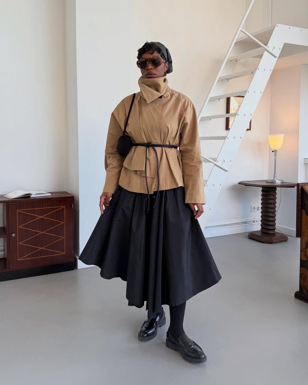 Grace in cropped trench and skirt