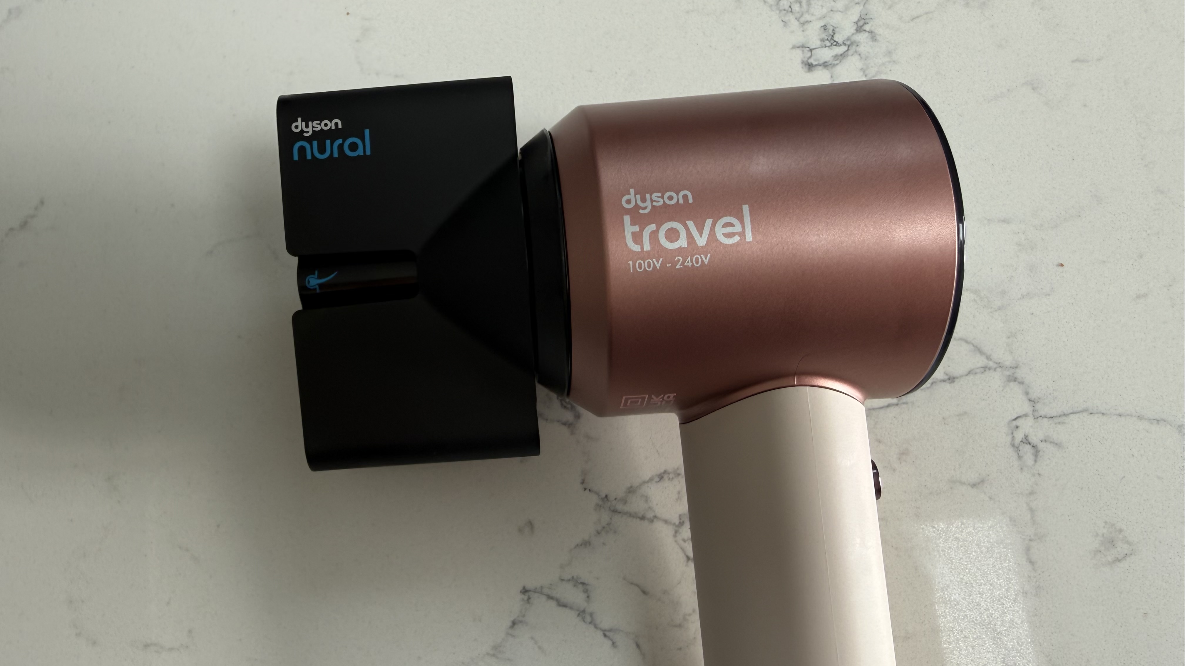 Dyson Supersonic Travel fitted with the Dyson Nural styling concentrator attachment