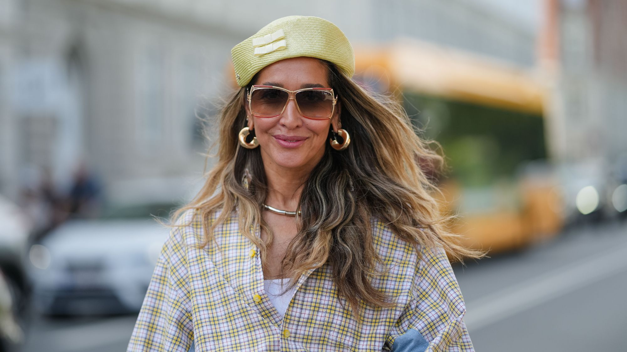 street style shot of woman with thick wavy hair