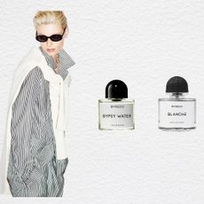 Byredo black friday cyber monday perfume sale header. A woman with blonde hair looking over her right shoulder wearing sunglasses and a black and white pinstriped set. She has a white sweater tied over her shoulders. Three byredo perfume bottles are beside her.