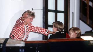32 of the best Princess Diana Quotes - Diana reaching out to hug her sons