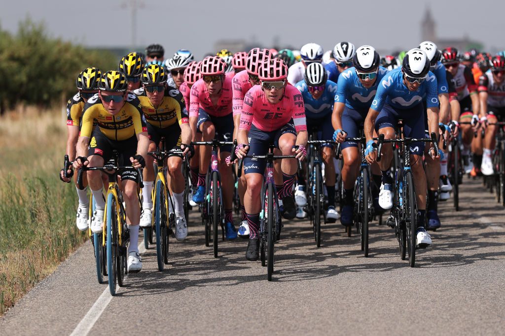 ALBACETE SPAIN AUGUST 18 LR Sam Oomen of Netherlands and Team Jumbo Visma Lawson Craddock of United States and Team EF Education Nippo and Carlos Verona Quintanilla of Spain and Movistar Team lead The Peloton during the 76th Tour of Spain 2021 Stage 5 a 1844km stage from Tarancn to Albacete lavuelta LaVuelta21 on August 18 2021 in Albacete Spain Photo by Gonzalo Arroyo MorenoGetty Images