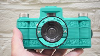 Sprocket Rocket being held up in a reviewer's hand