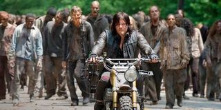 Daryl in front of a herd of walkers