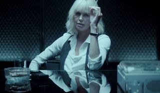Atomic Blonde Charlize Theron smoking during an interrogation