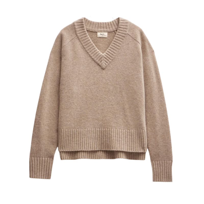 A cutout of an oversized beige V-neck jumper by Hush