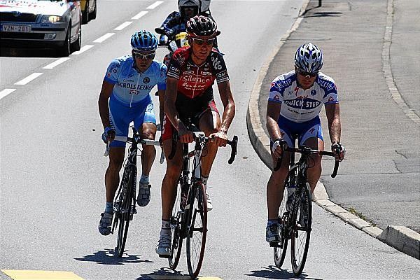 The three break-away riders head toward the finish.