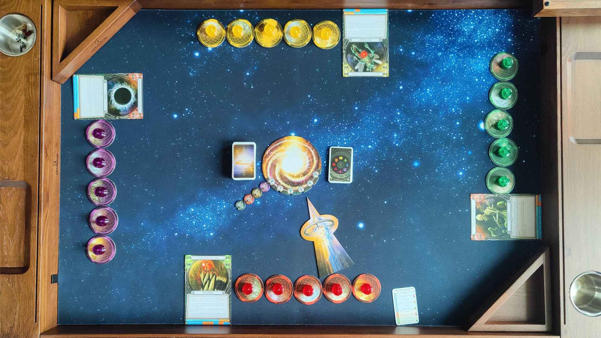 A four-player game of Cosmic Encounter, shown from above the table.