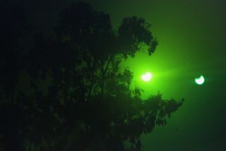 Annular Solar Eclipse Bathed in Green Light