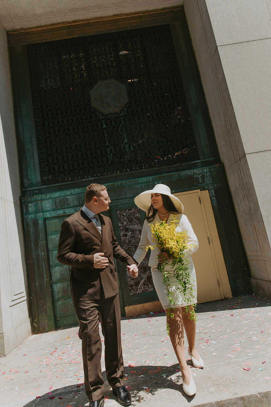 A bride wears vintage Galliano for her wedding.