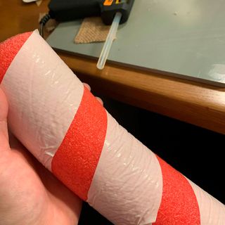 pool noodle with glue and craft table