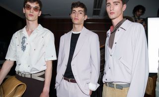 Males models wearing lilac and white clothes from the Salvatore Ferragamo S/S 2018 collection