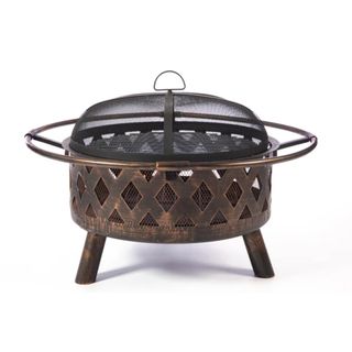 A Red Barrel Outdoor Fire Pit against a white background