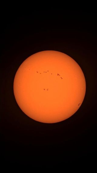 the sun with lots of sunspots