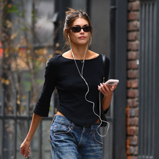 Kaia Gerber wearing a Cou Cou boat neck tee with relaxed jeans in NYC