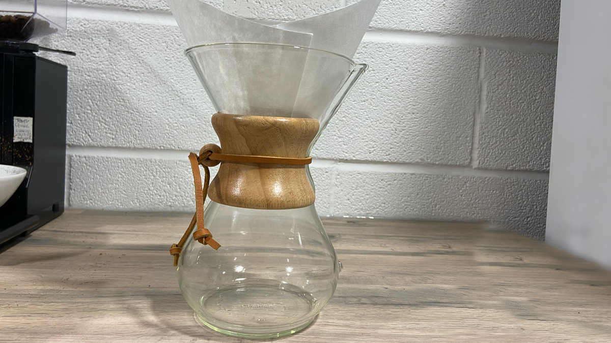 a chemex coffee maker being used to brew coffee