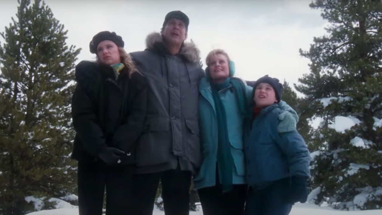 The Griswold family embracing snow on Christmas vacation in National Lampoon