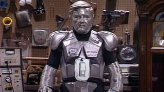 Phil Hartman dressed as a robot in Robot Repair sketch on SNL.