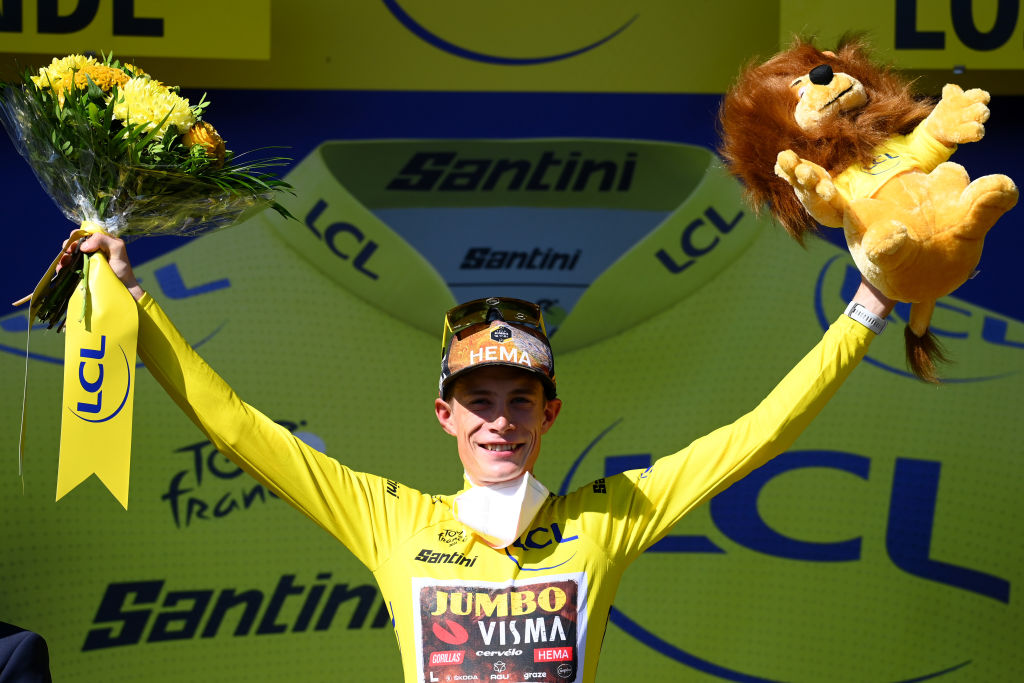 MENDE FRANCE JULY 16 Jonas Vingegaard Rasmussen of Denmark and Team Jumbo Visma celebrates winning the Yellow Leader Jersey on the podium ceremony after the 109th Tour de France 2022 Stage 14 a 1925km stage from SaintEtienne to Mende 1009m TDF2022 WorldTour on July 16 2022 in Mende France Photo by Tim de WaeleGetty Images
