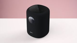 The WiiM sound, showing its controls on top, as well as the screen on the front