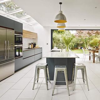 kitchen with kitchen island and bar stools