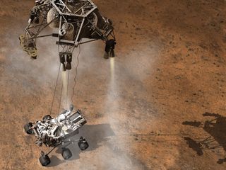 This artist's concept depicts a sky crane lowering NASA's Curiosity rover onto the Martian surface on Aug. 5, 2012.